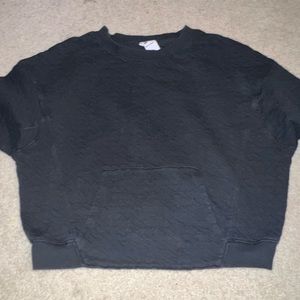 Black cropped sweater.